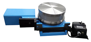 A rotary grinding table machine with a magnetized table top
