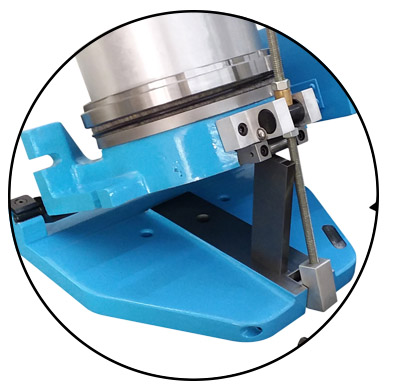 A CNC rotary grinding table machine showing an option sine angle feature